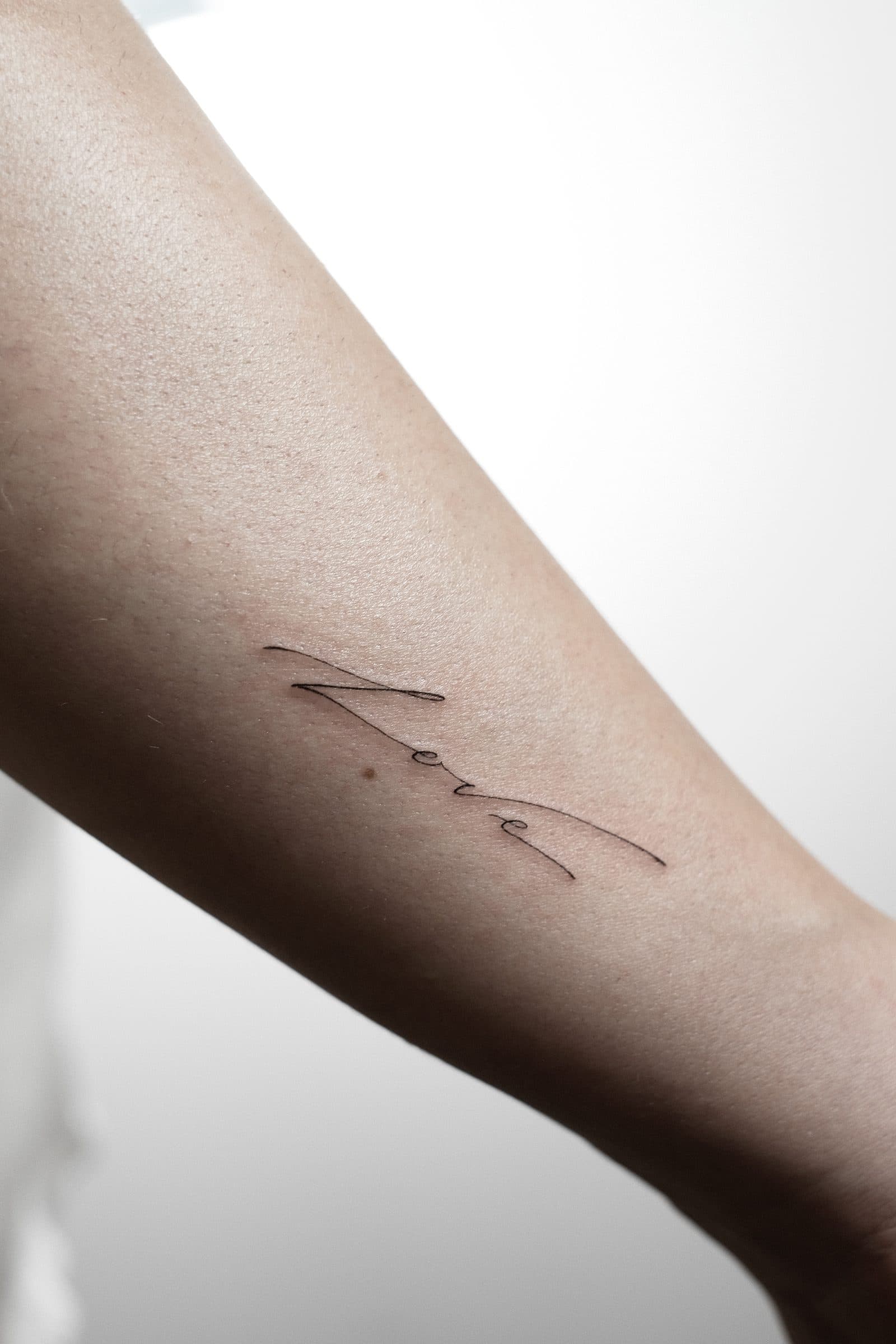 Fineline Tattoo – Schriftzug – SIJA.INK Zürich